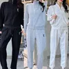 Femmes Designer Survêtements Full Emment Imprimer Zipper Casual Street Loisirs Mode Sweatshirts Blanc Noir Et Gris Hoodless Sweatshirtmm01