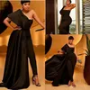 Plus Size African Sexy Black Jumpsuit Prom Dresses Appliques Paillettes Una spalla Overskirts Abiti da sera con tailleur pantalone Party3026