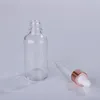 Partihandel glasåfyllningsbara droppflaskor 5-100 ml tom eterisk oljebehållare med nya rosguldlock bffte