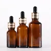 Lege pipet etherische olie amberglas serum fles groothandel tinctuur druppelaar flessen met nieuwe gouden deksels wkkge