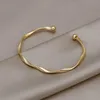 Pulseira de abertura de moda, pulseira de ouro brilhante, trançada, pulseira fina para mulheres, feminina, aberta, estilo minimalista, pulseira de punho, joias L230704