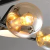 Ljuskronor modern ledning av lyster tak ljuskrona glas boll kök matsal hänge av heminredning inredning interiör hängande lampbelysning
