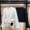 Vestes pour femmes Blazer blanc pour les femmes au printemps et à l'automne de 2023 avec un design de niche sens simple manteau ample court