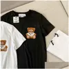 Kvinnors t-shirt kvinnors toppar tees sommar flockar tre-nsional tecknad björnbrev broderi lösa korta ärmar för män och kvinnor dhrae