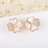 Nouveau Top Qualité Célèbre Marque De Mode Parti Bijoux Boucles D'oreilles Pour Les Femmes Or Rose Couleur 4 Coeurs 4 Feuilles Fleurs Oreille Pin288m