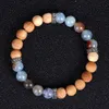 Bracelet en pierre fissurée naturelle avec perle en bois et diffuseur d'huile de roche de lave Style rétro extensible femmes Bracelets perles Strands3197