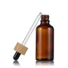 5 ml 10 ml 15 ml 20 ml 30 ml 50 ml 100 ml flacon compte-gouttes en verre ambré contenant d'huile essentielle de bambou en stock Kmqvu