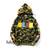 Nouveau 23ss femmes Mens Hoodies Camouflage designer jaune bleu épissage polaire chandail Plus la taille 3XL fermeture éclair Lovers Sweatshirts Mode Hoodie Veste streetwear