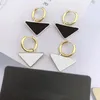 Nuevo diseñador Pendientes colgantes Encanto Carta Impreso Triángulo Espárragos con sellos Mujeres Personalidad Círculo Gota para el oído Dos métodos de uso 258N