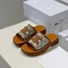 Clea yastıklı düz slayt terlikleri deri taban platformu sandaletler tuval triomphe damgalı lüks tasarımcı kadın tatil ayakkabıları fabrika ayakkabı boyutu 35-42