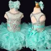 2020 Mint baby spädbarn Short Mini Cupcake Första nattvardsbollklänningar Rufffles Crystals Rhinestones Flower Girl Toddler Pageant Dres252V