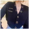 2023 New Women's Sweater Coat Designer broderad temperament V-ringningsskinn