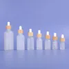 5ml 10ml 15ml 20ml 30ml 50ml 100ml Clear Frosted Glass Essential Oil Perfume Bottle E Liquid Reagent Pipette Dropper Bottle with Bamboo Konr