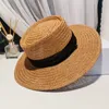 Stilista di moda cappello a tesa larga cappelli a secchiello cappello a tesa larga intrecciato cappello di protezione solare estate donna tinta unita cappellino largo da esterno visiera piatta cappelli di paglia intrecciati