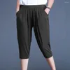女性用パンツ大規模8xl 150kg夏の女性ソリッドカラーカジュアルカジュアルレングスパンツ女性弾性ウエストルーズズボン