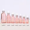 Bouteille d'huile essentielle vide en gros 5 ml 10 ml 15 ml 20 ml 30 ml 50 ml 100 ml couvercles en or rose flacons compte-gouttes en verre rose pour cosmétiques Iaqor