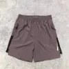 Pantaloncini sportivi da spiaggia larghi sottili in seta di ghiaccio ad asciugatura rapida Pantaloncini da uomo casual all'aperto