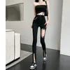 Calças femininas 2023 marca strass oco para fora mulheres elegantes skinny lápis calças fenda punho jeans preto pantalones mujer