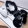 6 5CM black and white Acrylic hair ring Camellia rubber bands head rope for Ladys collection Fashion classic Items Jewelry headdre315v