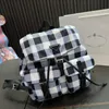 Fashionable backpack vintage plaid art backpack nylon drawstring travel school waterproof bag suitable for men and women triangle ruck sack bags