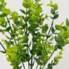 装飾的な花12pcs/セット人工ユーカリを茎の簡単なケア植物再利用可能なプラスチックフェイクグリーン植物の家の装飾用品