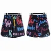 2023 Nuovi pantaloncini firmati Rhude Summer Fashion Beach Pantaloncini da uomo Uomo Street Wear di alta qualità Pantaloni rossi blu neri RH Court Sweat Bottoms yh9