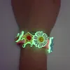 Shoe Parts Accessories Randomly 100 pieces of glowing cartoon shoes Charming silicone decoration Aniaml light in dark wristband accessories 230719