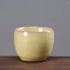 Ensemble en céramique de tasse simple de tasses de thé de maître jaune de tasses pour l'usage personnel