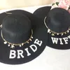 Breda brim hattar brud halm hatt personifierad med namn diamant bokstäver Bachelorette Bow Shells fru Kvinna Summer Beach Sun Black