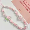 Mode rose acrylique perlé chaîne de téléphone portable pour femmes filles bijoux tendance mignon lanière femme charme accessoires L230619
