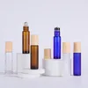 1 3OZ Empty Packaging Glass Roller Cosmetic Bottles Clear Blue Amber Frosted Colors with A and B Metal Ball Plastic Wooden Grain Lids Hgxqu