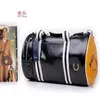 Topkwaliteit echt leer nieuwe mode mannen reistas Dames plunjezak merk designer bagage handtassen grote capaciteit sport bag196f