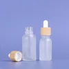 Hot Sale Portable Bamboo Lids Rensa 5-100 ml flaskan Tomglasdroppflaskor för eteriska oljor Makeup Oil ABMTV