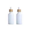 زجاجات قطارة خزفية بيضاء فارغة 10 مل 15 مل 20 مل 30 مل 50 مل 100 مل لتجميل الزيوت الأساسية مع أغطية الخيزران nmiul