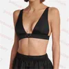 Costume da bagno sexy da donna con reggiseno a triangolo e distintivo a triangolo. Costume da bagno estivo con scollo a V profondo