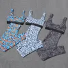 Textilaktiva gymnastiksdesigner Swimsuit med kuddar bikini bh set kvinnor mode badkläder 4 storlek långbyxa baddräkter sexiga för y3307