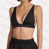 Costume da bagno sexy da donna con reggiseno a triangolo e distintivo a triangolo. Costume da bagno estivo con scollo a V profondo