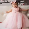 Baby Bruiloft Bloem Meisjes Jurken met Strik Kralen 3D-Applique Doorzichtig Lange Mouwen Pageant Gowns309V