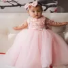 Baby Bruiloft Bloem Meisjes Jurken met Strik Kralen 3D-Applique Doorzichtig Lange Mouwen Pageant Gowns309V