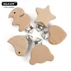 Bable The Leaters Toys 10pcs Beach Wood Pucifier Clip Animals Маленький слон птиц в форме сердца звезды Baby Diy Essential Castle Chain Accessories 230721