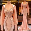 Plus La Taille Arabe Aso Ebi Luxueux Sirène Sexy Robes De Bal Pêche Rose Dentelle Perlée Manches Longues Soirée Formelle Partie Deuxième Recep265r