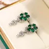 Boucles d'oreilles pendantes CAOSHI tempérament Lady's Drop avec cristal vert vif exquis fleur forme conception bijoux pour femmes cadeau gracieux