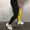 Calças masculinas masculinas esportivas casuais combinando com cores bolsos com cadarço calças leggings hip hop academia corrida jogging streetwear para