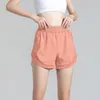 Shorts de corrida femininos para yoga com bolso lateral em elastano respirável para treino e leggings curtos para mulheres e esportes