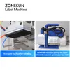 ZONESUN Étiqueteuse automatique à surface plane Applicateur d'étiquettes supérieures Bouteille Cartons Boîtes Sacs Cosmétiques Équipement ZS-TB60