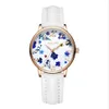 Temperamento fresco y simple Relojes para mujer Estudiantes Cinturón de cuero Reloj de cuarzo Luz Lujo Moda Fan Goddes Exquisito Wr238d