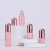 Varm försäljning 1-5 ml tom glas parfymrulle på flaskor rosa med rostfri rullkula och nyaste mössa LSPPN