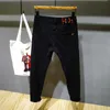 Men's Jeans designer pure black men jean autumn style comfortable elastic slim fit small feet Plush trendy pants O77W