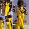 Желто-модная вечерние платья для комбинезона с длинным рукавом 2021 кружевное пятно, сексуальное V-образное выпускное выпускное платье с африканским вырезом с брюками.