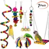 7 Unids / set Mascota Loro Juguete Colgante Masticar Morder Bolas de ratán Hierba Columpio Campana Pájaro Periquito Jaula Accesorios Suministros para mascotas 204k